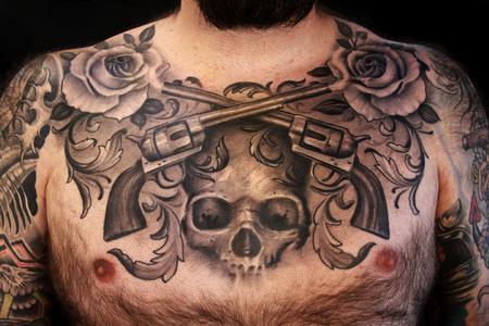 Cory Norris - black and grey chest piece